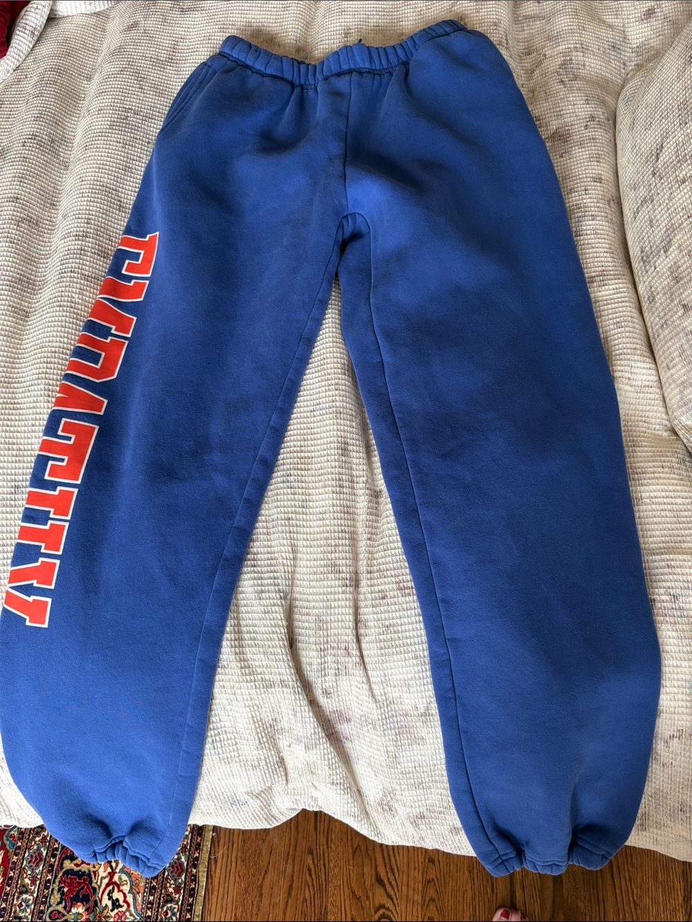 Blue Elastic-Waist Graphic Sweatpants with “Empathy” Side Lettering